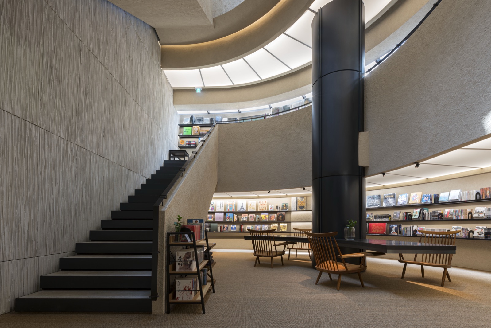 Spiral staircase and bookshelves at GRAPHIC Itaewon